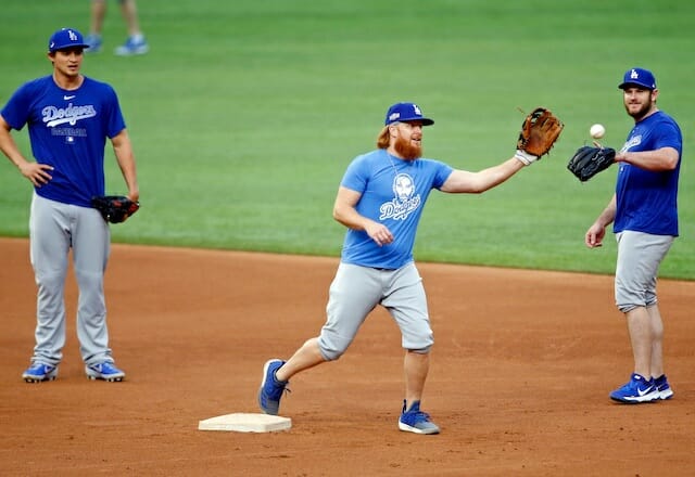 Los Angeles Dodgers' infielder Max Muncy celebrates with teammate