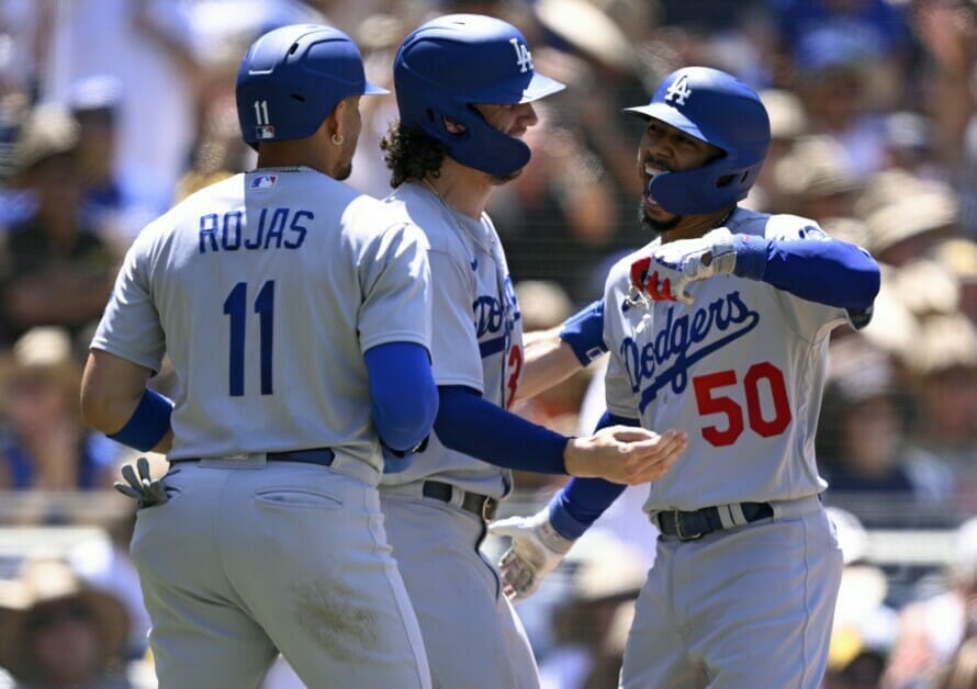 Dodgers take 2 behind hot-hitting Betts