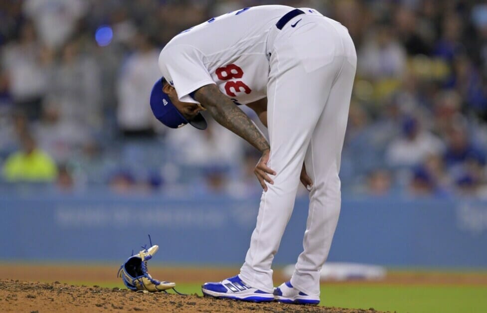 Yency Almonte injury: Dodgers RHP hurts right knee, exits in 9th